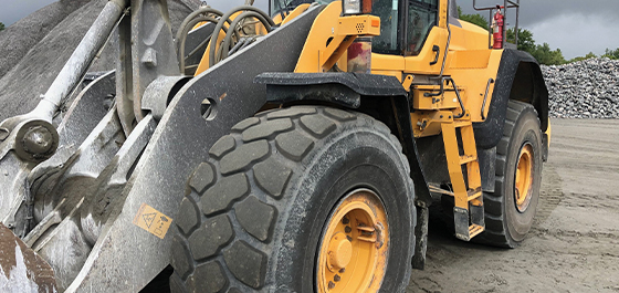 image of a construction vehicle with OTR tires