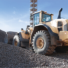 a backhoe on construction/quarry site